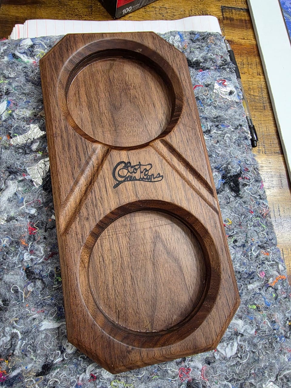 Dark wood tray with two round wells and the Lotz Creations mark burned into the centre
